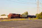 CP AC44CW Locomotive leading a train